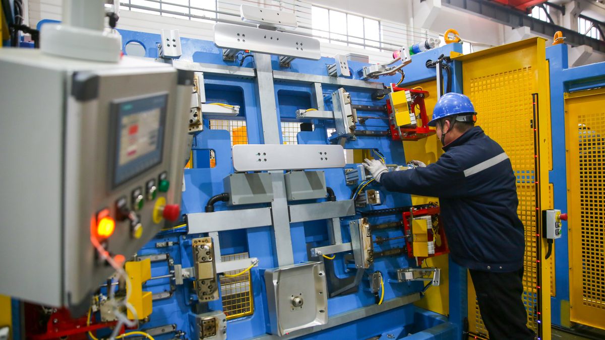 NANTONG, CHINA - JANUARY 22: An employee produces auto parts to be exported to Poland at the factory of Jiangsu Haogao Machinery Co., Ltd. on January 22, 2024 in Nantong, Jiangsu Province of China. (Photo by Xu Hui/VCG via Getty Images)