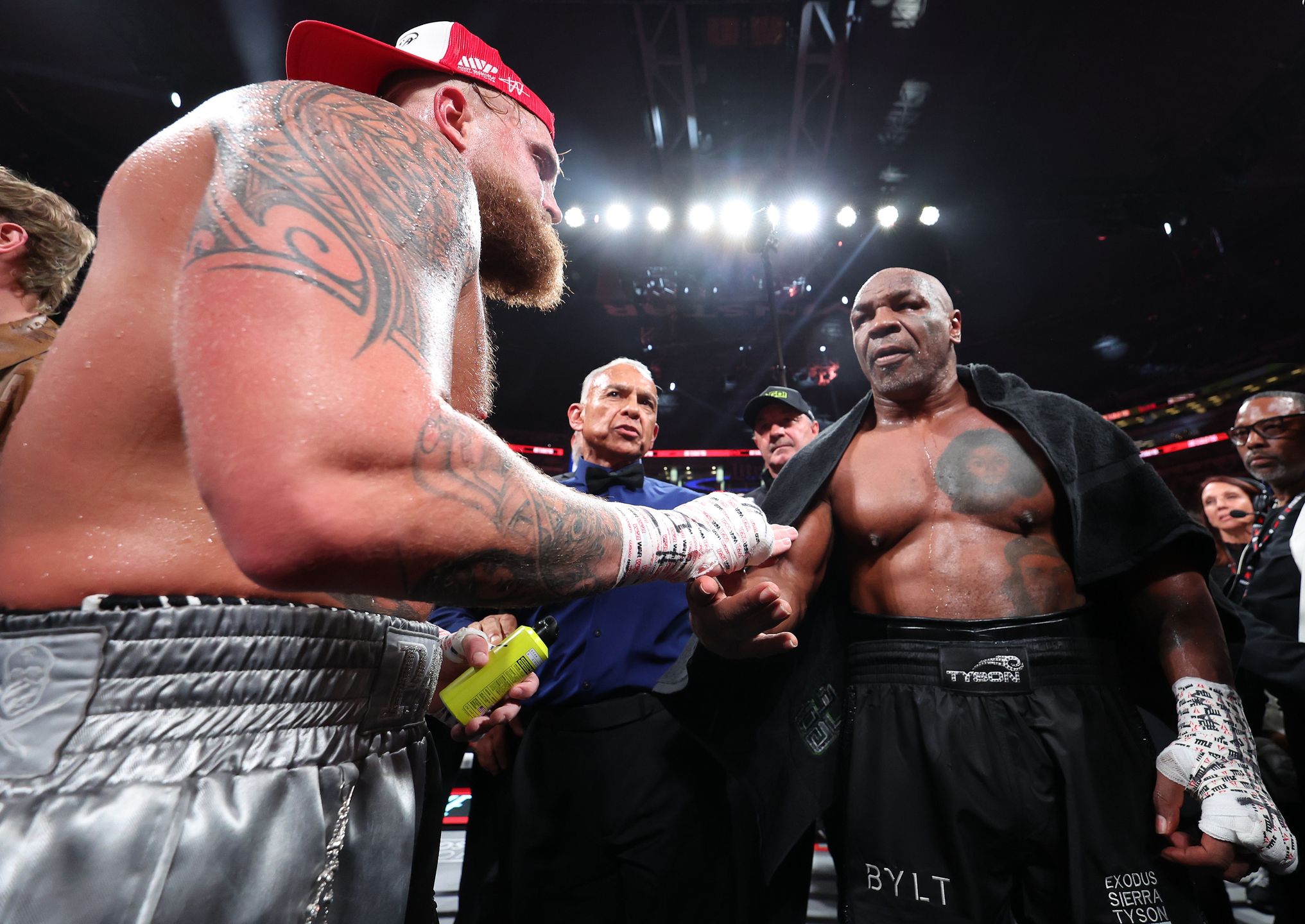 ARLINGTON, TEXAS - NOVEMBER 15: ARLINGTON, TEXAS - NOVEMBER 15: (L-R) Jake Paul announced as winner against Mike Tyson during LIVE On Netflix: Jake Paul vs. Mike Tyson at AT&T Stadium on November 15, 2024 in Arlington, Texas.  (Photo by Al Bello/Getty Images for Netflix © 2024)