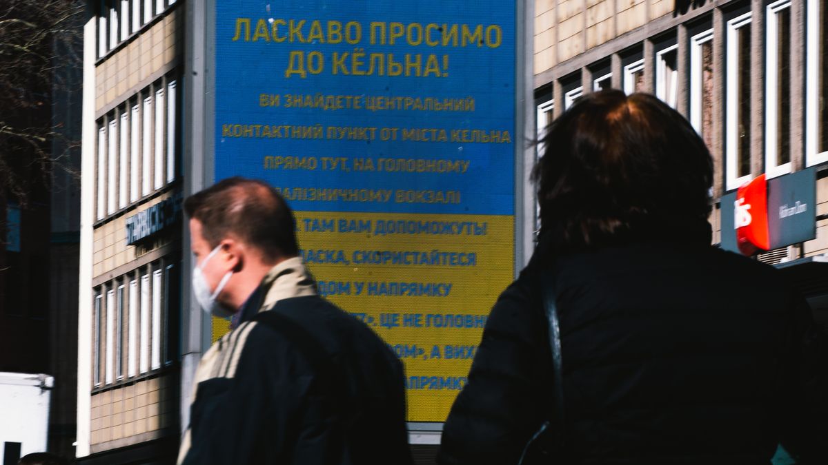 welcome to Cologne sign in Ukrain is seen in front of Cologne central station in Cologne, Germany on March 10, 2022 as more and more refugees from Ukraine will arrive in the west of Germany (Photo by Ying Tang/NurPhoto via Getty Images)