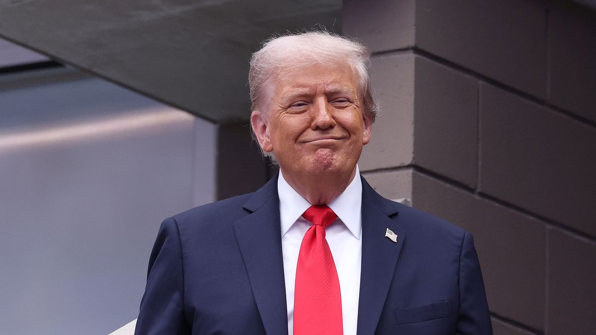 NEW YORK, NEW YORK - SEPTEMBER 07: U.S. President Donald Trump reacts as he arrives prior to the Men's Singles Final match between Jannik Sinner of Italy and Carlos Alcaraz of Spain on Day Fifteen of the 2025 US Open at USTA Billie Jean King National Tennis Center on September 07, 2025 in New York City. (Photo by Clive Brunskill/Getty Images)