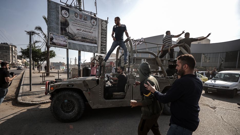 GAZA CITY, GAZA - OCTOBER 7: Israeli military vehicle is seized by the Palestinians as the al-Qassam Brigades, the armed wing of Hamas clashes with the Israeli forces, in Gaza City, Gaza on October 7, 2023. (Photo by Ali Jadallah/Anadolu Agency via Getty Images)