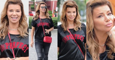 Szczęśliwa Edyta Górniak pozuje paparazzim na ulicy (ZDJĘCIA)