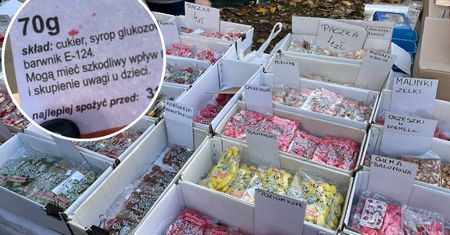 Pod cmentarzem ustawiają się długie kolejki. Mało kto patrzy na etykietę z ostrzeżeniem