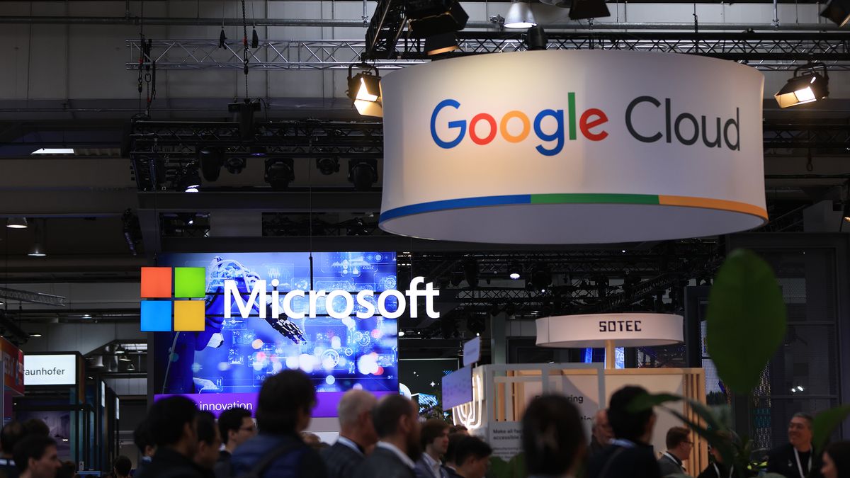 The Microsoft Corp. and a Google Cloud stands at the Hannover Messe industrial technology fair in Hanover, Germany, on Thursday, April 20, 2023. The German government must adopt more cautious fiscal policies that complement the European Central Bank's efforts to tackle inflation in order to help the economy, the country's deputy finance minister, Florian Toncar, told Bloomberg Television. Photographer: Krisztian Bocsi/Bloomberg via Getty Images