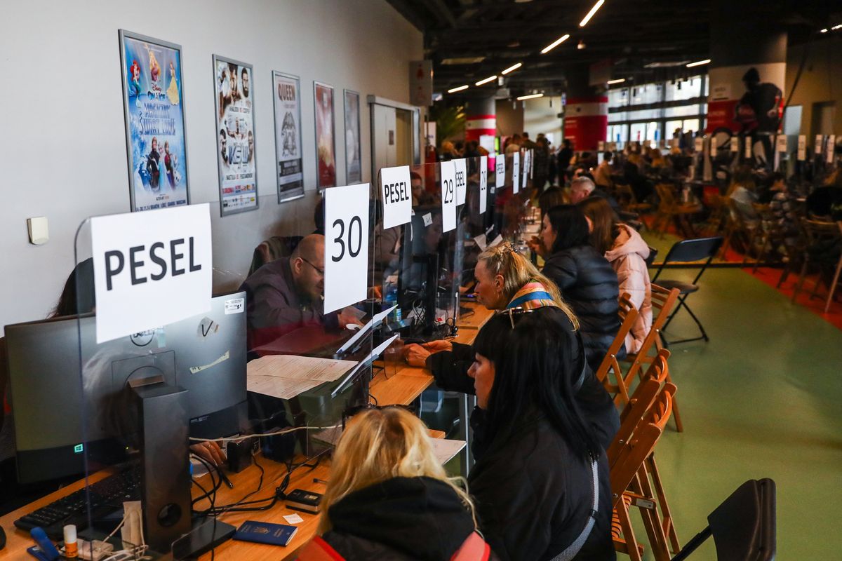 Refugees from Ukraine who fled to Poland after Russian attack are seen at the register point in Tauron Arena to obtain a PESEL national identification number and remain in the country. Krakow, Poland on April 13, 2022. Russian invasion on Ukraine causes a mass exodus of refugees to Poland.   (Photo by Beata Zawrzel/NurPhoto via Getty Images)