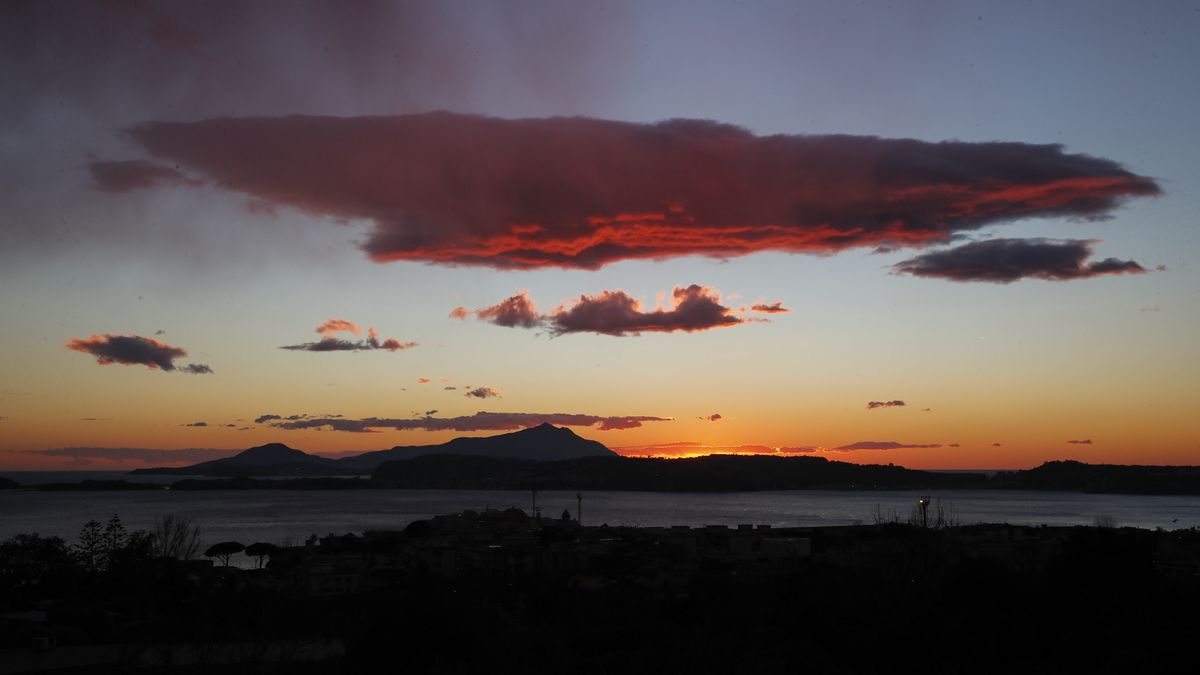 POZZUOLI, CAMPANIA, ITALY - 2022/02/01: View the Pozzuoli city seafront in the colors of the sunset over the sea, in Campi Flegrei zone, Campania region. (Photo by Salvatore Laporta/KONTROLAB/LightRocket via Getty Images)