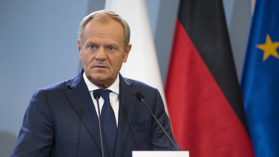 WARSAW, MASOVIAN VOIVODESHIP, POLAND - 2024/07/02: PM Donald Tusk speaks at a press conference with German Chancellor Olaf Scholz (not in view) in Warsaw. Polish-German intergovernmental consultations were held at the Chancellery of the Prime Minister in Warsaw under the chairmanship of Prime Minister Donald Tusk and Chancellor of the Federal Republic of Germany Olaf Scholz. Prime Minister Tusk and Chancellor Scholz, together with their ministers, talked about the security of the North Atlantic Treaty Organizations (NATO) eastern flank in the context of the war in Ukraine, the threats related to illegal migration, as well as economic cooperation between the two countries and about the World War 2 reparations. (Photo by Attila Husejnow/SOPA Images/LightRocket via Getty Images)