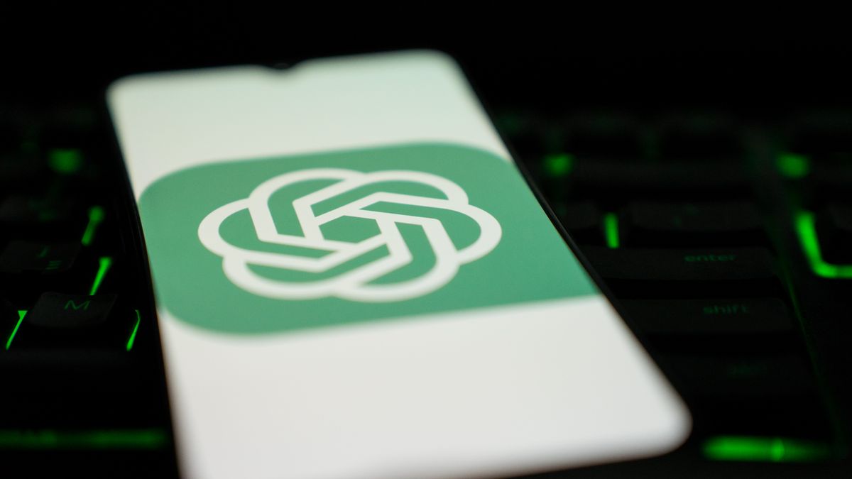 ChatGPT logo is seen on a smartphone screen over a keyboard. (Photo by Nikos Pekiaridis/NurPhoto via Getty Images)