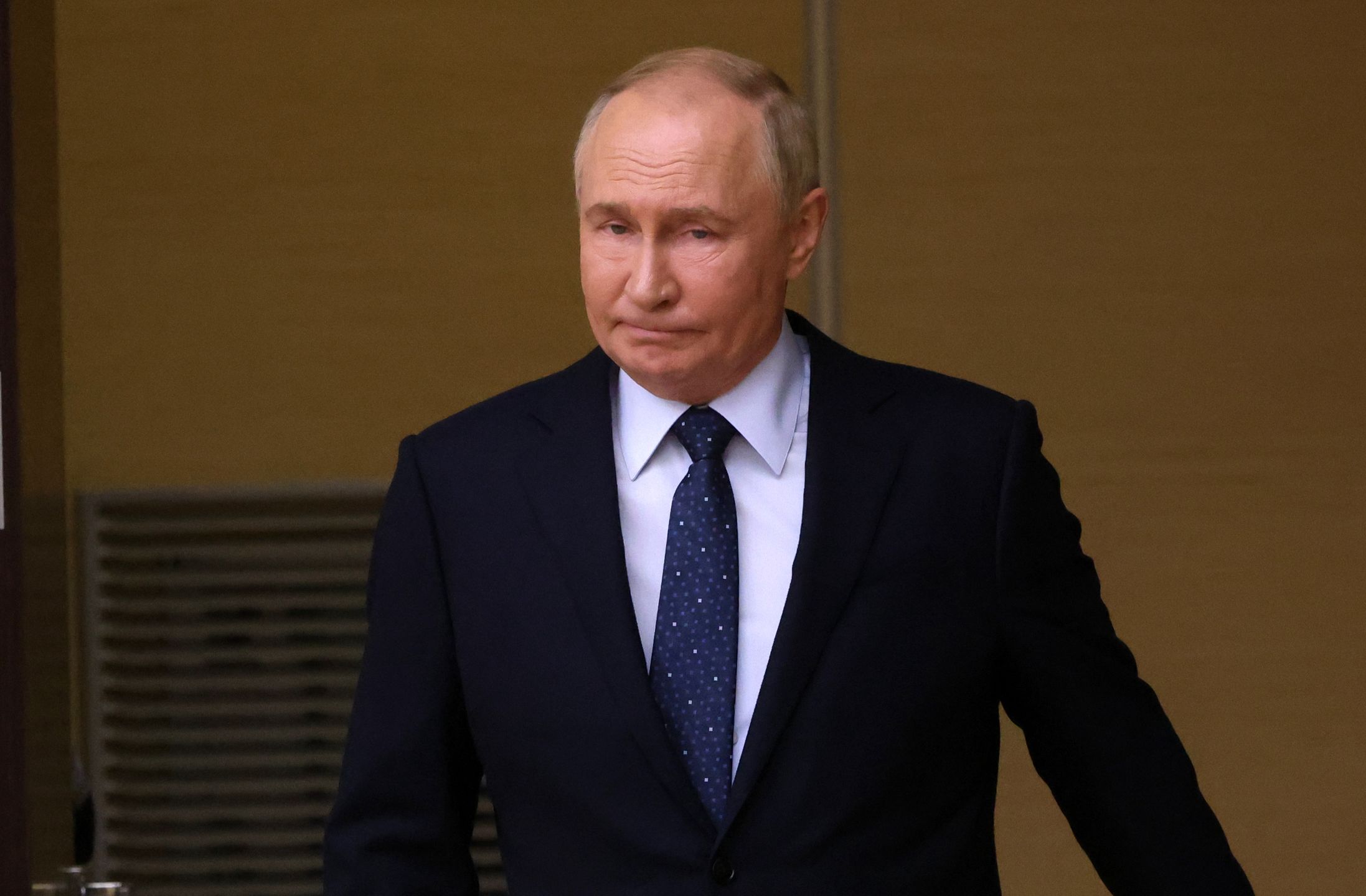 MOSCOW, RUSSIA - AUGUST 7: (RUSSIA OUT) Russian President Vladimir Putin enters the hall during his meeting with minister at Novo-Ogaryovo State Residence on August 7, 2024, in Moscow, Russia. This week Putin called for Iran to limit damage in any relations against Israel. (Photo by Contributor/Getty Images)