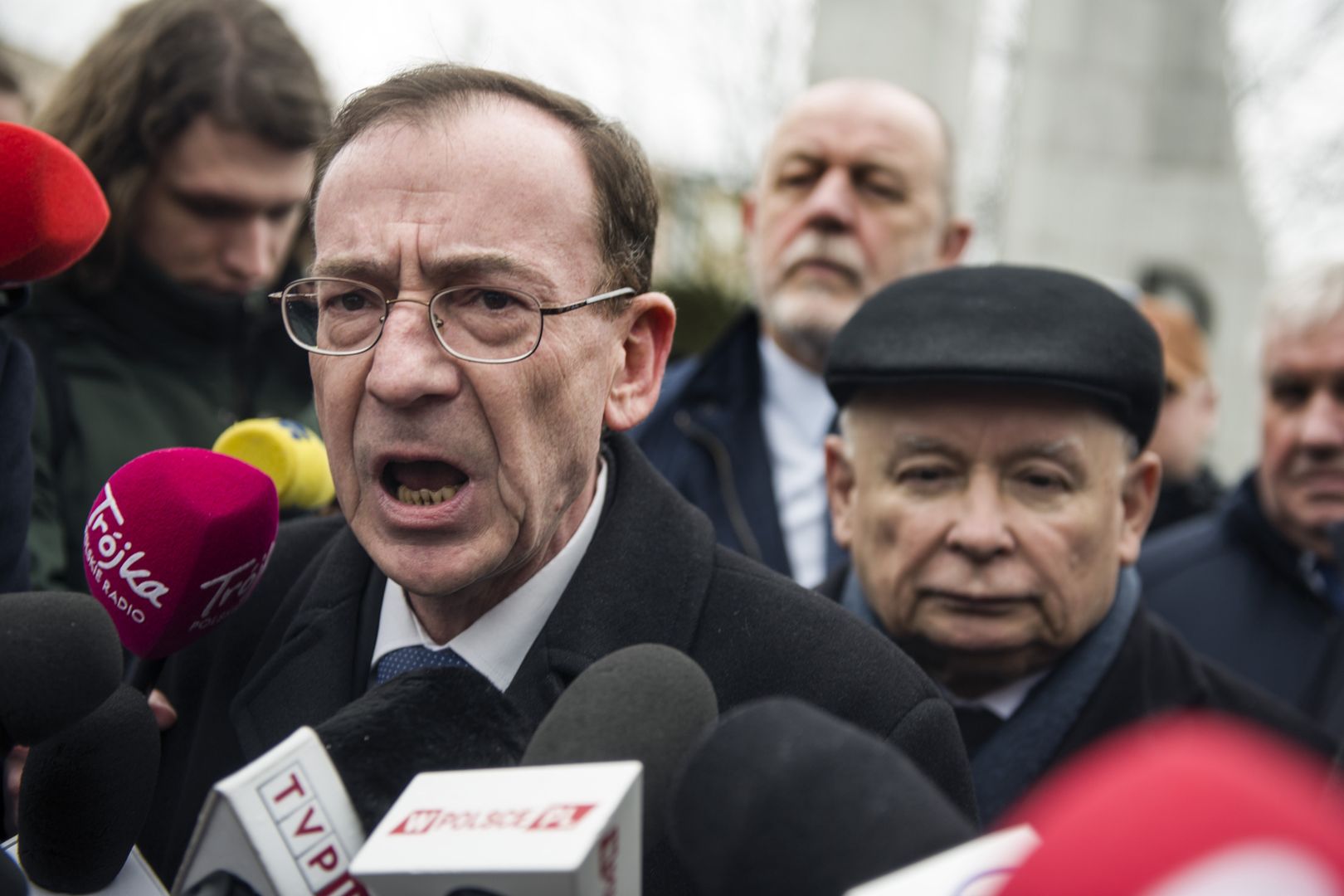 WARSAW, MASOVIAN VOIVODESHIP, POLAND - 2024/02/07: Former Minister of Interior and Administration, Mariusz Kaminski who is released from prison after a second presidential pardon speaks to the media outside the Parliament. Former interior minister, Mariusz Kaminski and his deputy Maciej Wasik were jailed last month after being sentenced for abuse of power for actions taken in 2007, when they served in an earlier Law and Justice-led government and previously led the Central Anti-Corruption Bureau (CBA). They claimed to be "political prisoners" and they also lost their parliamentary mandates.They tried to push their way into parliament, supported by a group of senior Law and Justice (PiS) politicians. President Duda had pardoned both politicians after they were first sentenced in 2015 but Poland's Supreme Court deemed his move invalid, saying a pardon could not be granted before a final ruling in the case was issued. The two politicians were sentenced to two years in prison in December. President Duda pardoned them again in January. (Photo by Attila Husejnow/SOPA Images/LightRocket via Getty Images)