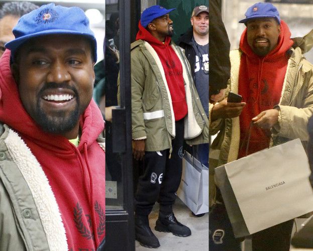 Dorodny i uśmiechnięty Kanye West wybiera bluzeczki w drogim sklepie