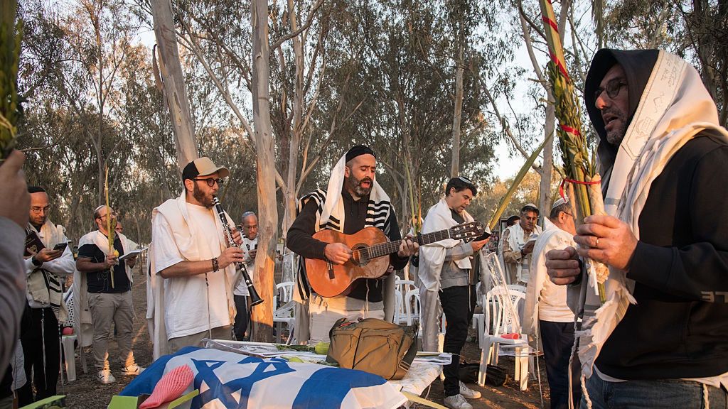 Thousands of believers came to pray "Hoshanna Rabbah" on the
TEL AVIV, ISRAEL - 2025/10/13: Thousands of believers came to pray "Hoshanna Rabbah" on the morning of the eve of Simchat Torah at the memorial site for the victims of the Nova Festival opposite the border with the Gaza Strip during the Iron Swords War. This is also the seventh day of the Sukkot holiday. Hoshana Rabbah is considered the final day of the divine "judgment" in which the fate of the new year is determined. (Photo by Eli Basri/SOPA Images/LightRocket via Getty Images)
SOPA Images
solidarity, captivity, hostages, memorial site, hamas, gaza, pray, hoshanna rabbah, believers, nova festival