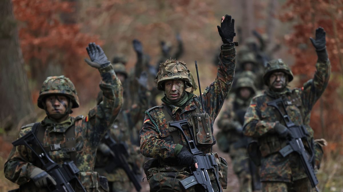 Bundeswehr New Recruits Undergo Basic Training
PRENZLAU, GERMANY - NOVEMBER 29: New army (Heer) recruits of the Bundeswehr, Germany's armed forces, signal while on patrol during basic training in a forest on November 29, 2022 near Prenzlau, Germany. German Chancellor Olaf Scholz, following Russia's invasion of Ukraine, pledged to create a special fund of EUR 100 billion to invest in Germany's armed forces, which will go to both high tickets investments like modern attack aircraft and transport helicopters but also into improved preparedness of existing equipment.  (Photo by Sean Gallup/Getty Images)
Sean Gallup
soldiers