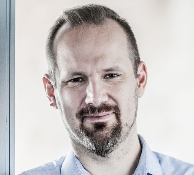 Marcin Dec z Sigmy Bis z dyplomem MBA Collegium Humanum