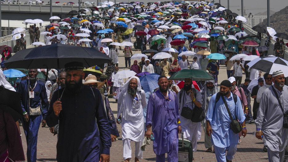 Temporary
Muslim pilgrims use umbrellas to shield themselves from the sun as they arrive to cast stones at pillars in the symbolic stoning of the devil, the last rite of the annual hajj, in Mina, near the holy city of Mecca, Saudi Arabia, Tuesday, June 18, 2024. Muslim pilgrims were wrapping up the Hajj pilgrimage in the deadly summer heat on Tuesday with the third day of the symbolic stoning of the devil, and the farewell circling around Kaaba in Mecca's Grand Mosque. (AP Photo/Rafiq Maqbool)
Rafiq Maqbool