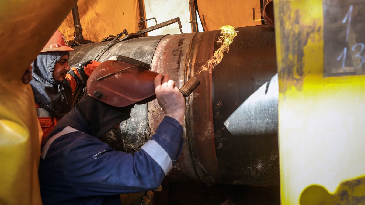 A construction worker uses a gas torch while working on a section of the TurkStream natural gas pipeline operated by Gastrans, a joint venture of Srbijagas JP and Gazprom PJSC, at the gas supply landing site in Zajecar, Serbia, on Tuesday, Jan. 14, 2020. Serbias economic growth accelerated in the second half of 2019, fueled by construction of a pipeline to ship Russian gas via Turkey and Bulgaria, as well as higher public and private spending as the nation heads into  an election year. Photographer: Oliver Bunic/Bloomberg via Getty Images