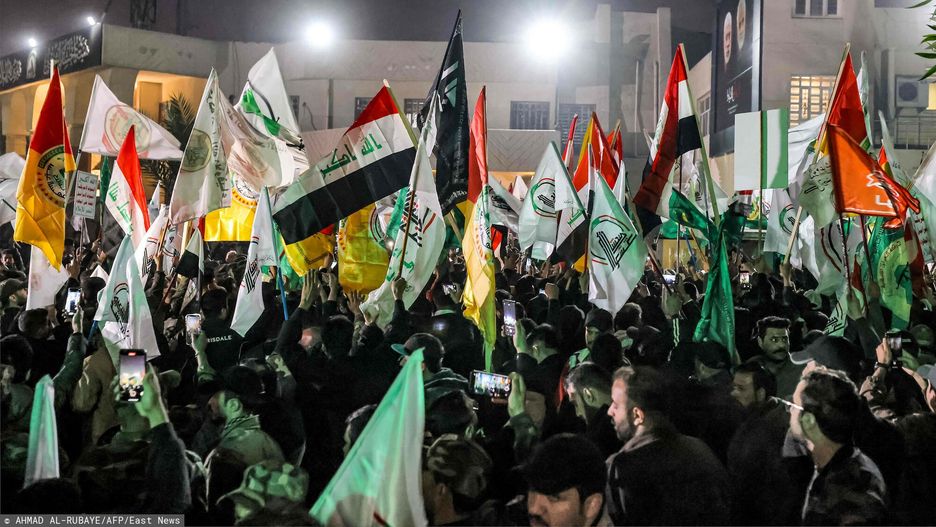 Pogrzeb dow�dcy Si? Mobilizacji Ludowej w Iraku
Members of Iraq's Popular Mobilisation Forces (PMF) paramilitaries gather with the group's flags and Iraqi national flags during the funeral of their slain members at the PMF headquarters in Baghdad on January 4, 2024. A US strike in Baghdad on January 4 killed a military commander of the PMF, an ex-paramilitary faction of the grouping said, with an Iraqi security official reporting two deaths in a drone attack. Harakat al-Nujaba, one of the PMF's factions, said in a statement that "the deputy commander of operations for Baghdad, Mushtaq Talib al-Saidi", had been "martyred in a US strike". (Photo by Ahmad Al-Rubaye / AFP)
AHMAD AL-RUBAYE