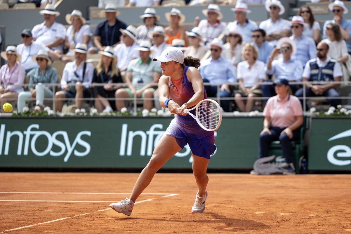 PARIS, FRANCE - June 08: Iga Swiatek of Poland in action against Jasmine Paolini of Italy during the Women's Singles Final on Court Philippe-Chatrier at the 2024 French Open Tennis Tournament at Roland Garros on June 8th, 2024, in Paris, France. (Photo by Tim Clayton/Corbis via Getty Images)