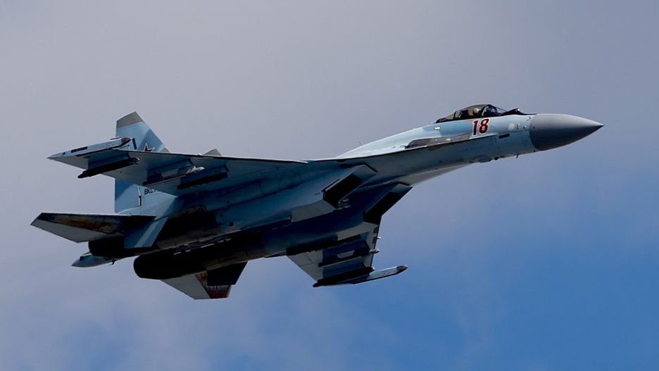 MOSCOW, RUSSIA - MAY 7: Sukhoi Su-35S flies over the Kremlin during the general rehearsals of the Victory Day Parade in front of the Kremlin at Red Square, on May 7, 2021 in Moscow, Russia. The military parade at Red Square is planned for May 9 to commemorate the victory of Soviet Union over Nazi Germany in WWII, despite the corovavirus (COVID-19) outbreak. (Photo by Sefa Karacan/Anadolu Agency via Getty Images)