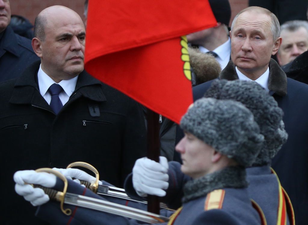 Russian President Vladimir Putin marks the Fatherland's Defender Day in MoscowMOSCOW, RUSSIA - FEBRUARY,23 (RUSSIA OUT) Russian President Vladimir Putin (R) and  Prime Minister Mikhail Mishustin (L) look on soldiers during the wreath laying ceremony to the Tomb of Unknown Sodier in front of the Kremlin, Moscow, Russia, February,23,2020. Russians marks the Fatherland's Day on February, 23 as a Soviet tradition of marking the day  of Red Army, created on February,23,1918. (Photo by Mikhail Svetlov/Getty Images)Mikhail Svetlov