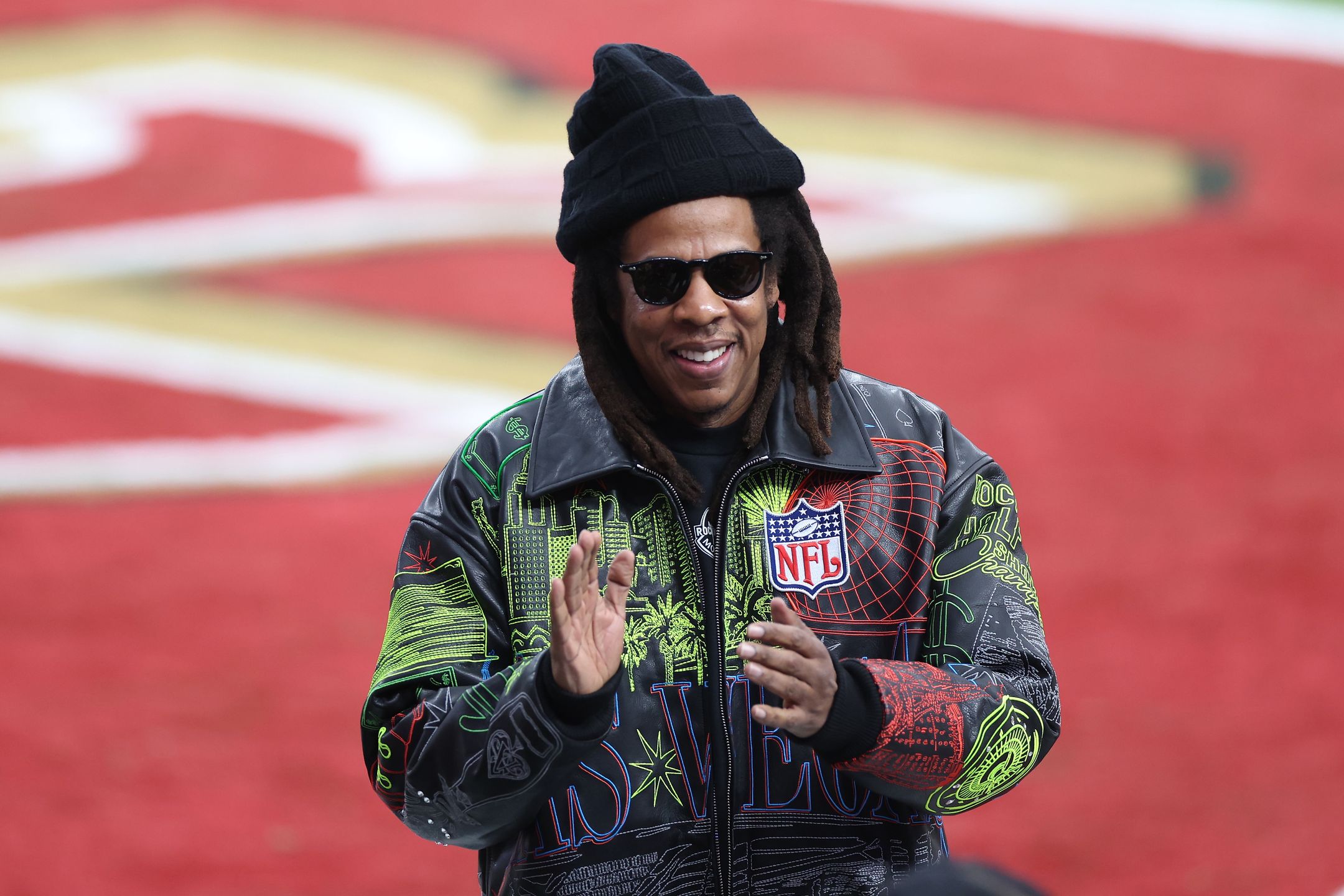 Super Bowl LVIII - San Francisco 49ers v Kansas City ChiefsLAS VEGAS, NEVADA - FEBRUARY 11: American Rapper Jay-Z reacts before Super Bowl LVIII between the San Francisco 49ers and Kansas City Chiefs at Allegiant Stadium on February 11, 2024 in Las Vegas, Nevada. (Photo by Steph Chambers/Getty Images)Steph Chambersamerican football