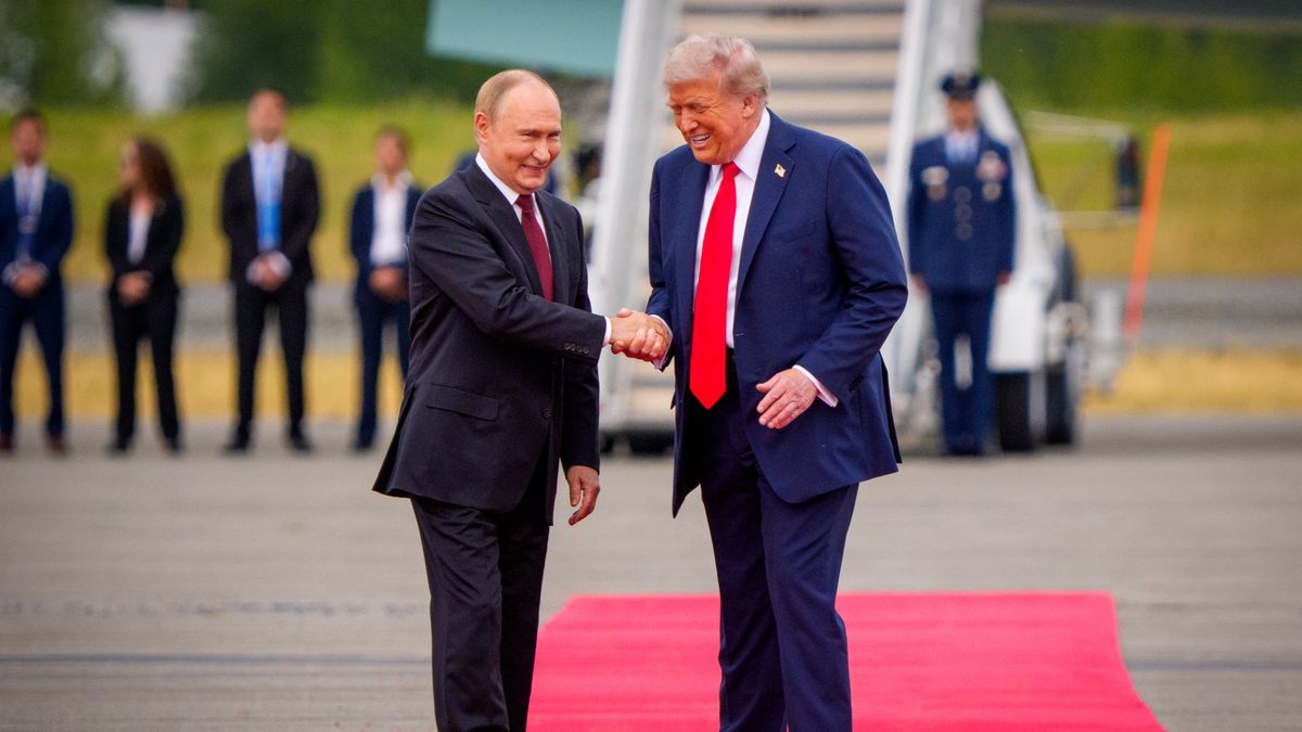 ANCHORAGE, ALASKA - AUGUST 15: U.S. President Donald Trump (R) greets Russian President Vladimir Putin as he arrives at Joint Base Elmendorf-Richardson on August 15, 2025 in Anchorage, Alaska. The two leaders are meeting for peace talks aimed at ending the war in Ukraine. (Photo by Andrew Harnik/Getty Images)