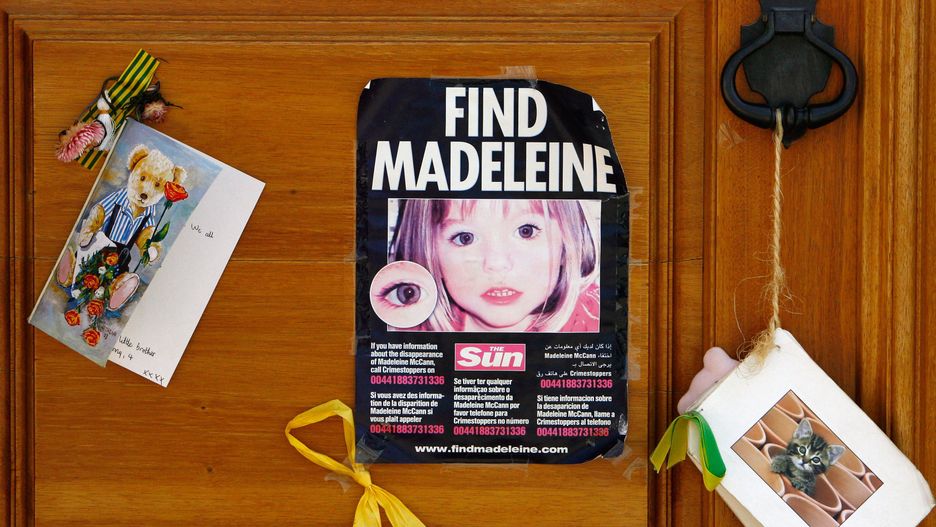 LAGOS, PORTUGAL - AUGUST 09: A poster and cards are placed on the Church door in Praia da Luz for missing Madeleine McCann August 9, 2007 in Praia da Luz, Portugal. Police continue there investigation in the Algarve village after blood was found in the McCann Apartment. (Photo by Jeff J Mitchell/Getty Images)