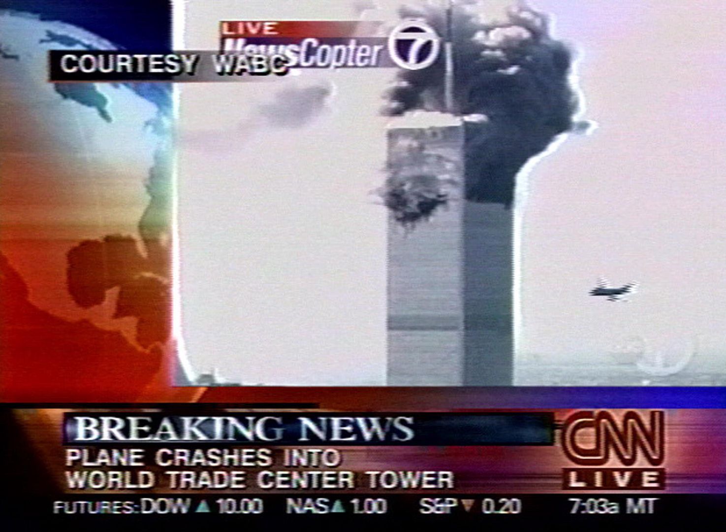 ALL
FFM01 - 20020902 - NEW YORK, UNITED STATES : (FILES) The day the earth stood still.  As CNN broadcast WABC television film footage above their breaking news headline, a second aircraft (right) is about to hit the second World Trade Centre tower of 11 September, 2001.    Two aircraft crashed within minutes of each other into the towers. Last year's terrorist attacks on the World Trade Center and the Pentagon, killing about 3.000 people, lead to the massive strike on Osama bin-Laden's terrorist network al-Qaida in Afghanistan and all over the world. (ORIGINALLY ISSUED AS DCA03)   EPA PHOTO  AFPI /  CNN     NO MAGS NO SALES NO INTERNET
CNN