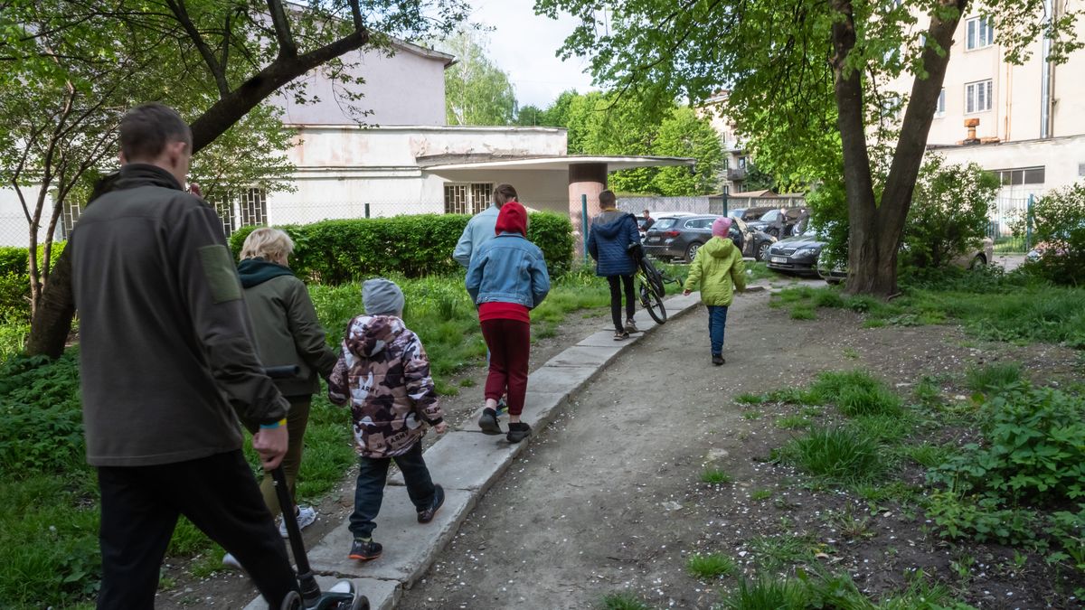 LVIV, UKRAINE - MAY 8: 57-year-old grandmother Olena (L) and her grandchildren walk on the street in Lviv, Ukraine, May 8, 2023. Olena from Slovyansk raises her 7 grandchildren by herself. Olena's son Andriy, the father of 5 children, fought in the east of Ukraine since 2016 and died after being seriously wounded in the war in July 2022. The children's mother abandoned them as Olena became a mother and father for the children. Olena and her children left Slovyansk, where the hostilities and difficult living conditions continued in March 2022. At first, they all lived together in a boarding school, then with the help of volunteers they were able to rent an apartment with comfortable living conditions. Olena is going to stay in Lviv, because it is safer in the west of Ukraine. (Photo by Olena Znak/Anadolu Agency via Getty Images)