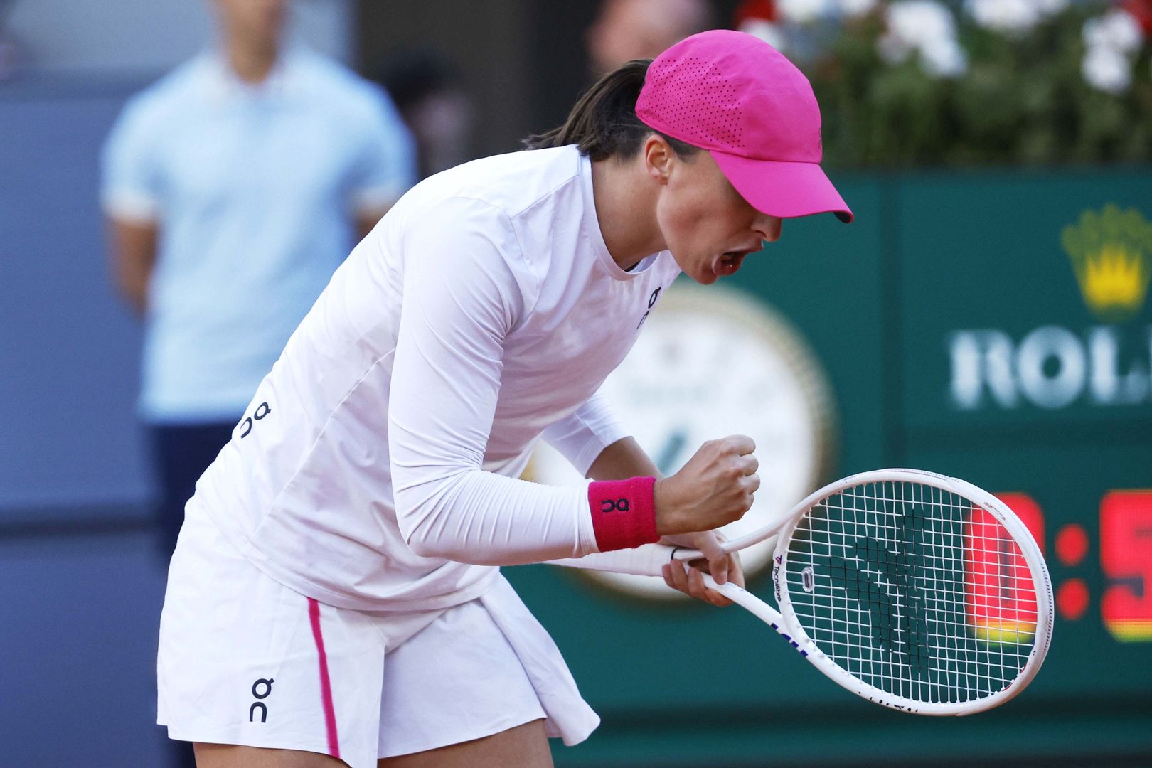Iga Swiatek of Poland celebrates a point during her women's singles final match against Aryna Sabalenka of Belarus at the Madrid Open tennis tournament in Madrid, Spain, 04 May 2024. EPA/JUANJO MARTIN Dostawca: PAP/EPA.