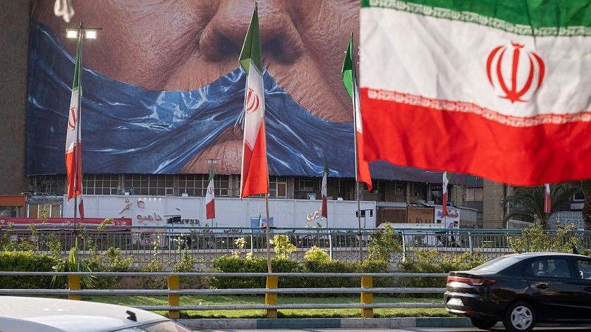 Daily Life In Tehran As A Possible New War LoomsA young girl sits in a vehicle as it drives beneath a billboard depicting an AI-generated image of the Strait of Hormuz and an effigy of U.S. President Donald Trump, displayed on the wall of a state building in downtown Tehran, Iran, on May 3, 2026. (Photo by Morteza Nikoubazl/NurPhoto via Getty Images)NurPhotoiran-u.s.-relations, strait-of-hormuz, politic, u.s.