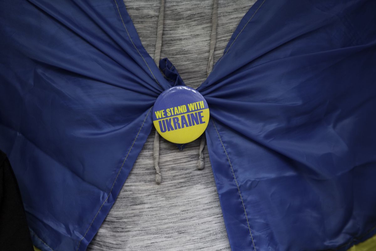 Anti-war demonstrators have been pinned to stand with Ukraine, in Bangkok, Thailand, on March 19, 2022.  (Photo by Atiwat Silpamethanont/NurPhoto via Getty Images)