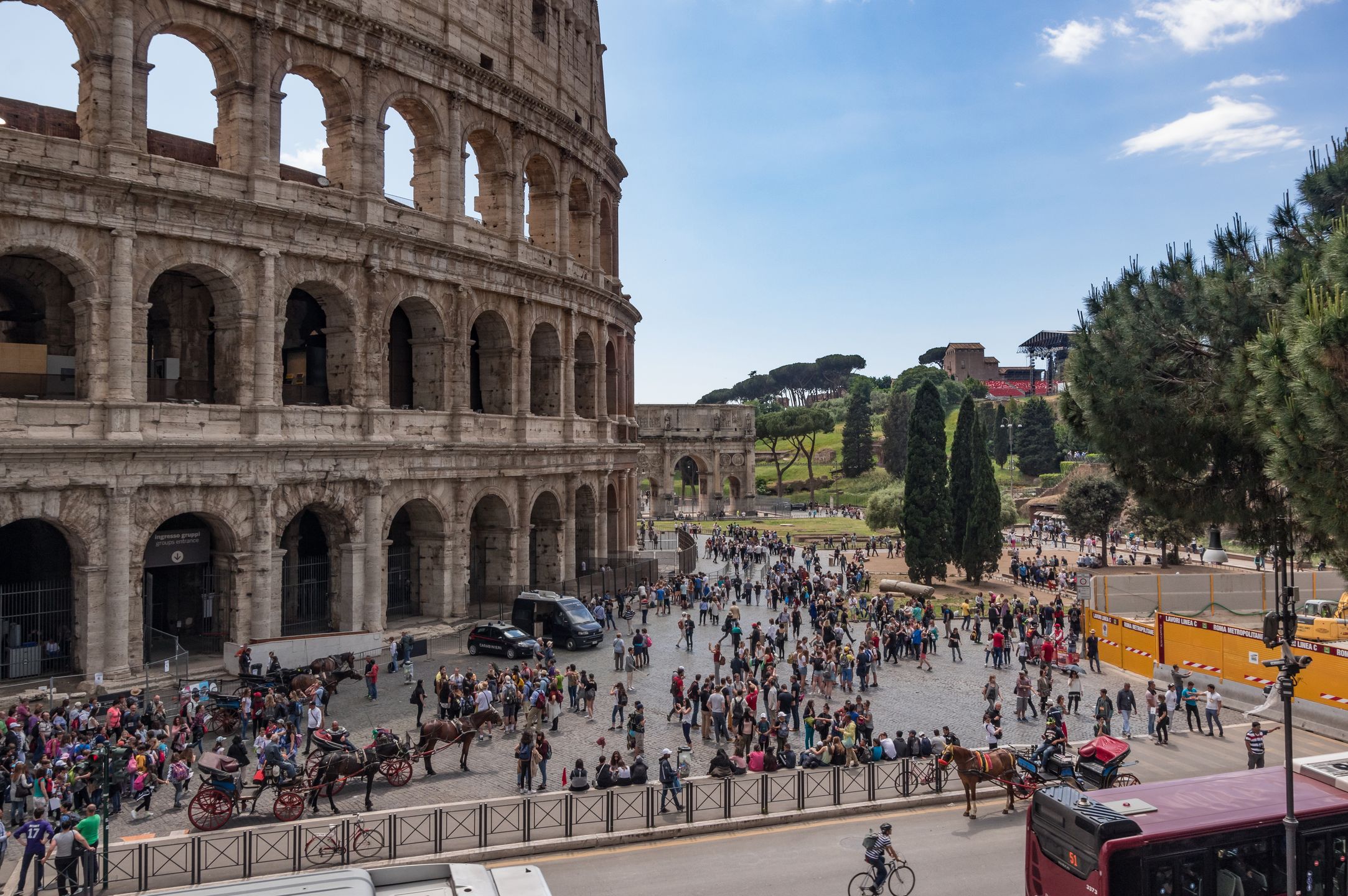Crowds of tourists at the Coliseum
Any time of the day or year, the world renown landmark and historic site of the Coliseum in Rome, draws crowds from all over the world. The attraction is well kept and organised, and is also served by the Roman underground, which has a station right in front of the monument. On top of the underground station, is a great vantage point, from which the picture was taken, capturing the moment of crowds visiting the Coliseum.
Image by Ramesh Thadani
rom, roman coliseum, rome, amphitheatre, attraction, blue sky, colosseum, construction, crowd of people, cyclist, national symbol, tourist activity, tourist attraction, tourist destination, tourists