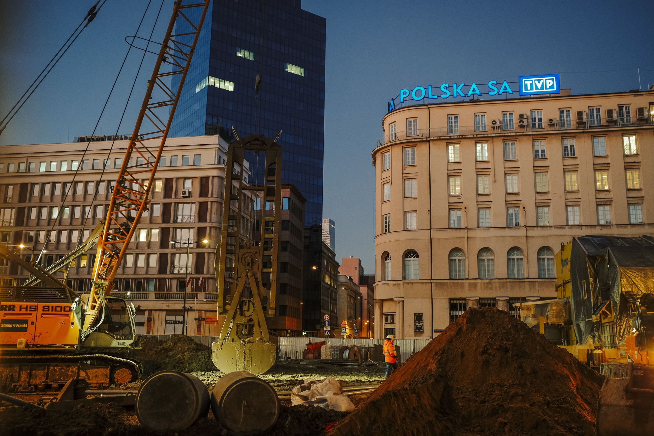 A construction site on Powstancow Warszawy Square outside the Telewizja Polska SA headquarters in central Warsaw, Poland, on Wednesday, Jan. 4, 2022. Poland left borrowing costs unchanged as the threat of an economic recession overshadows concerns over the highest inflation in more than a quarter century. Photographer: Damian Lemaski/Bloomberg via Getty Images