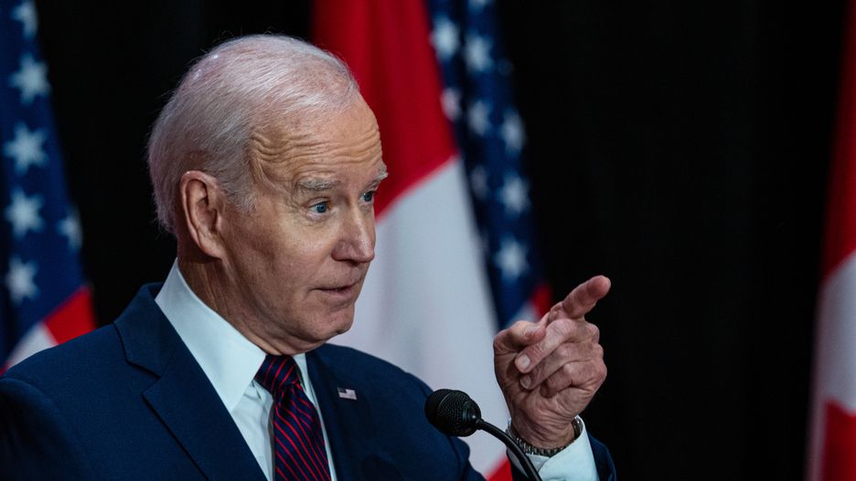 OTTAWA, ONTARIO, CANADA - 2023/03/24: U.S. President Joe Biden points at a journalists as he speaks during a joint press conference with Canadian Prime Minister Justin Trudeau (not in view) at the Sir John A. Macdonald Building in Ottawa. This is the first official visit that the American president has made to Canada since becoming president. Though visits between elected presidents and the allied country typically take place sooner, Bidens inaugural visit to the northern neighbor was delayed due to COVID-19 travel restrictions. (Photo by Katherine KY Cheng/SOPA Images/LightRocket via Getty Images)