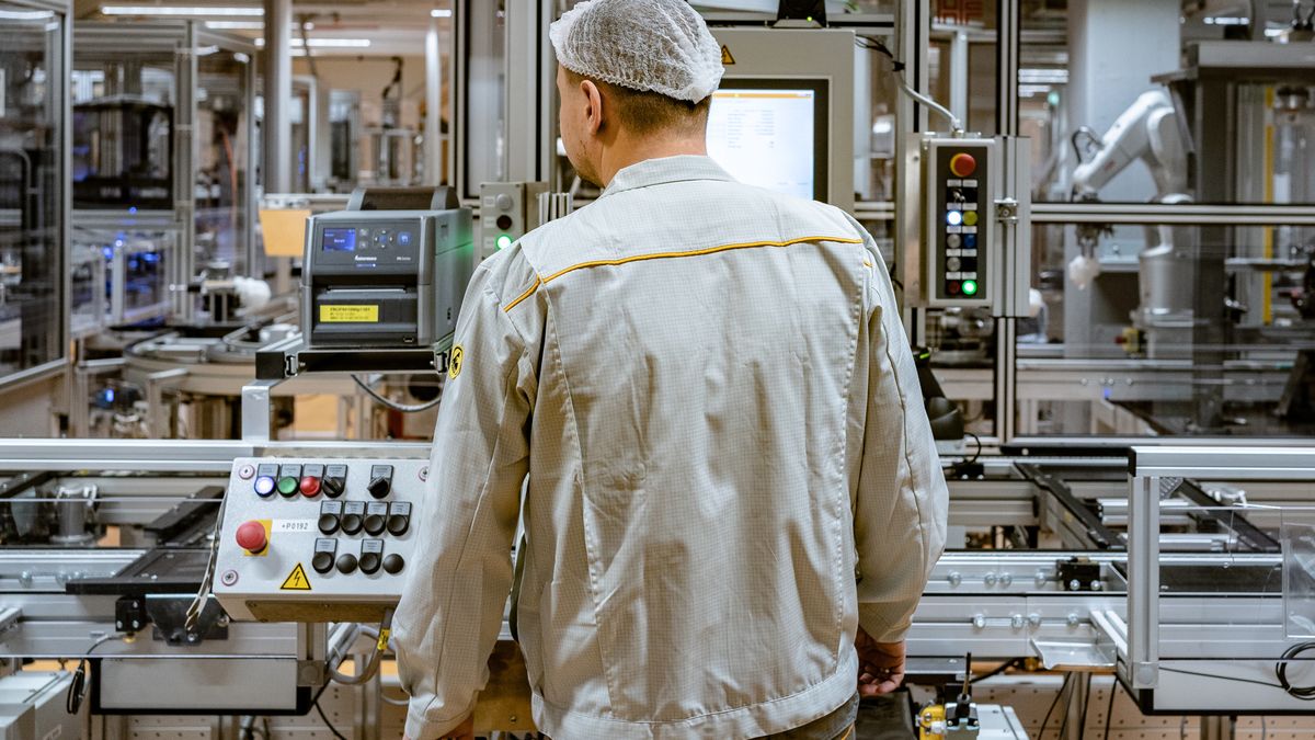 An employee operates a machine on the production line of the MK C2 brake system module at the Continental AG manufacturing plant in Frankfurt, Germany, on Friday, March 3, 2022. The German auto supplier is scheduled to announce full year earnings on March 8. Photographer: Ben Kilb/Bloomberg via Getty Images