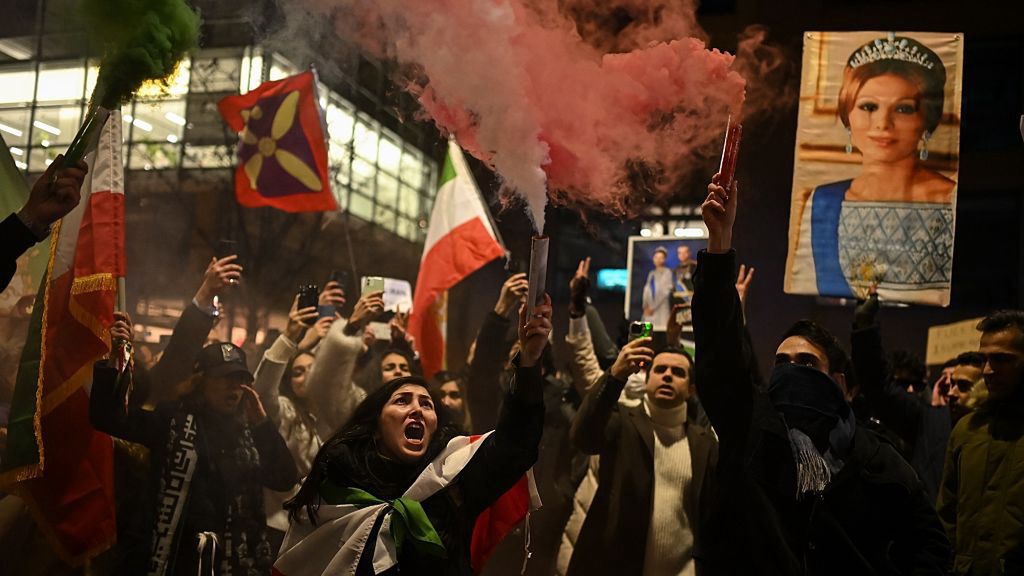 Rally in Milan to support anti-government protests in Iran
MILAN, ITALY - JANUARY 10: People hold Iranian and other country flags with banners during the rally to support of the anti-government protests in Iran on January 10, 2026 in Milan, Italy. (Photo by Piero Cruciatti/Anadolu via Getty Images)
Anadolu
torch, peopel, anti government protests, flags, rally