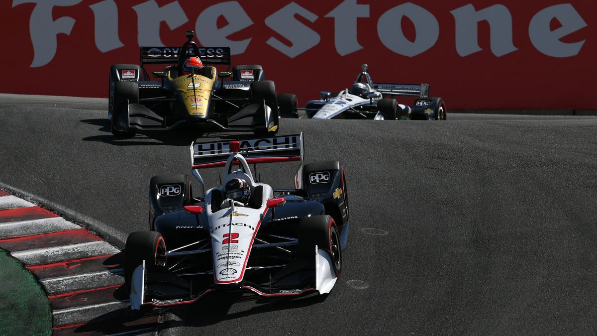 MONTEREY, CALIFORNIA - SEPTEMBER 22: Josef Newgarden #2 of United States and Hitachi Team Penske Chevrolet leads James Hinchcliffe #5 of United States and Arrow Schmidt Peterson Motorsports Honda during the NTT IndyCar Series Firestone Grand Prix of Monterey at WeatherTech Raceway Laguna Seca on September 22, 2019 in Monterey, California. (Photo by Robert Reiners/Getty Images)