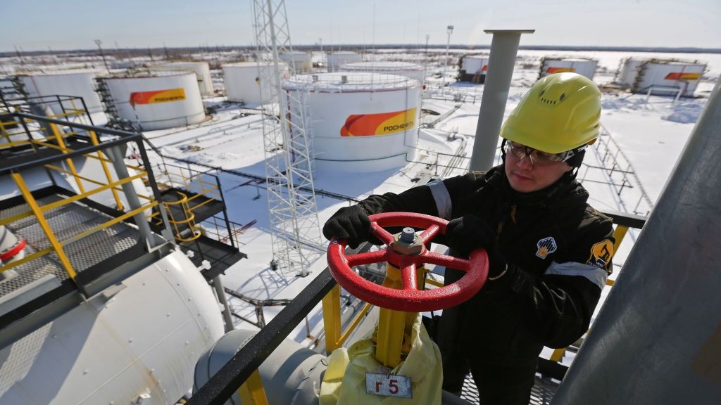 Siberian Oil Giant That Bankrolled Soviets May Gush Cash Again
A worker turns a flow valve near oil storage tanks at a pumping station, operated by Rosneft PJSC, in the Samotlor oilfield near Nizhnevartovsk, Russia, on Monday, March 20, 2017. Russia's largest oil field, so far past its prime that it now pumps almost 20 times more water than crude, could be on the verge of gushing profits again for Rosneft PJSC. Photographer: Andrey Rudakov/Bloomberg via Getty Images
Bloomberg
Petroleum, Natural Resources, Oil, Gasoline, Drilling, EU, Crude Oil, Energy, Gas, Europe, Derrick, Rig, Markets, E.U., EMEA