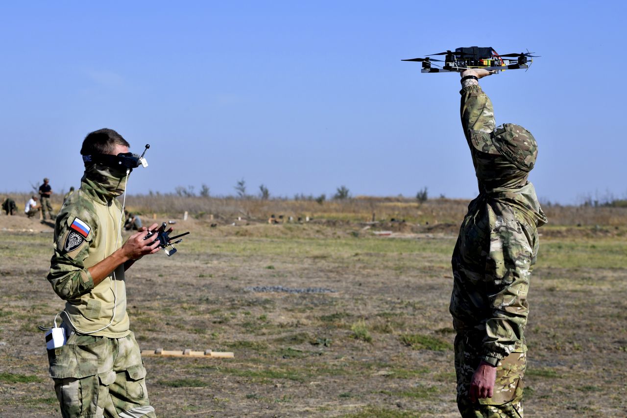 Russian soldiers fight drones with shotguns and acrobatics