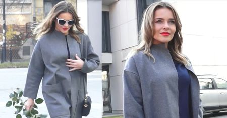 Edyta Herbuś pozuje na otwarciu butiku