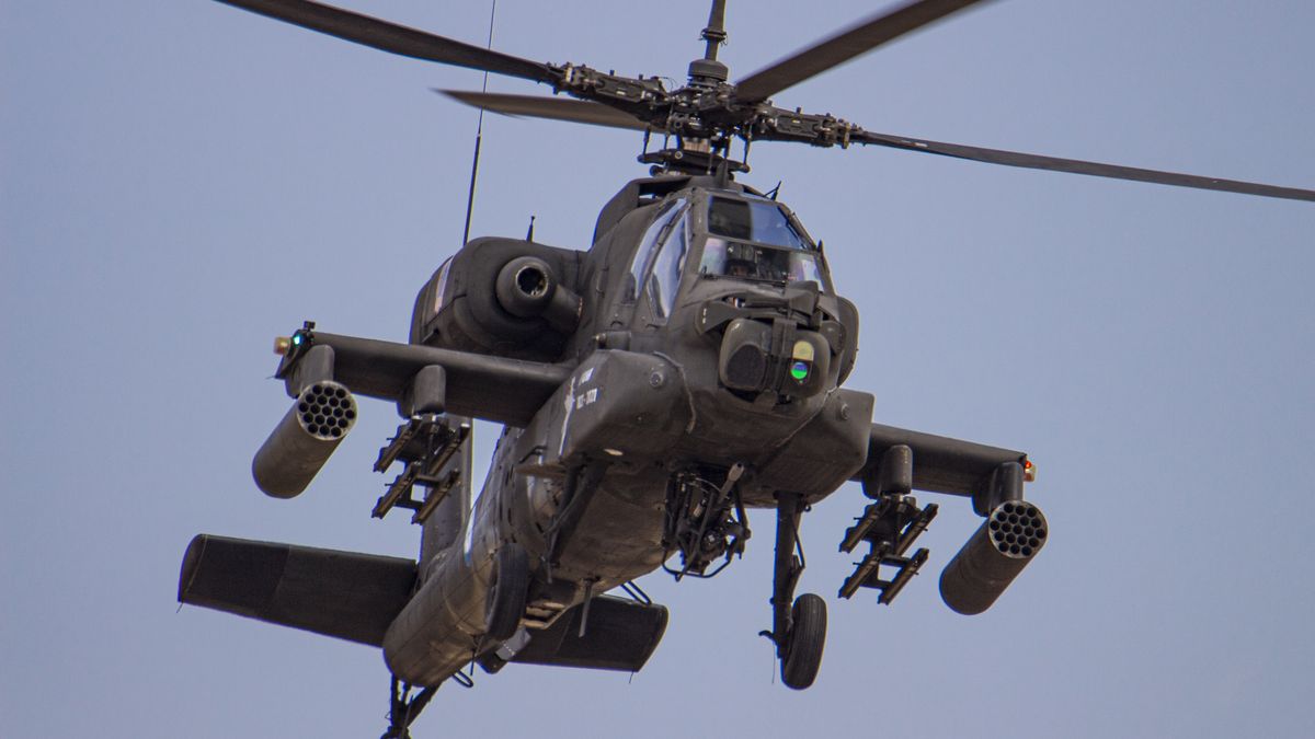 A Boeing AH-64 Apache helicopter from the Greek Army as seen flying and manoeuvering during a flying display demonstration during Athens Flying Week 2021 Air Show at Tanagra Air Base Airport. The Apache of the Hellenic military is the AH-64D Apache Longbow version. The specific aircraft is a twin turboshaft attack combat helicopter under the fuselage and on the wings with a machine gun, missiles, rocket and self defense capabilities. Greece, a country with strong air force is a member state of the North Atlantic Treaty Organization NATO. Tanagra, Greece on September 5, 2021 (Photo by Nicolas Economou/NurPhoto via Getty Images)