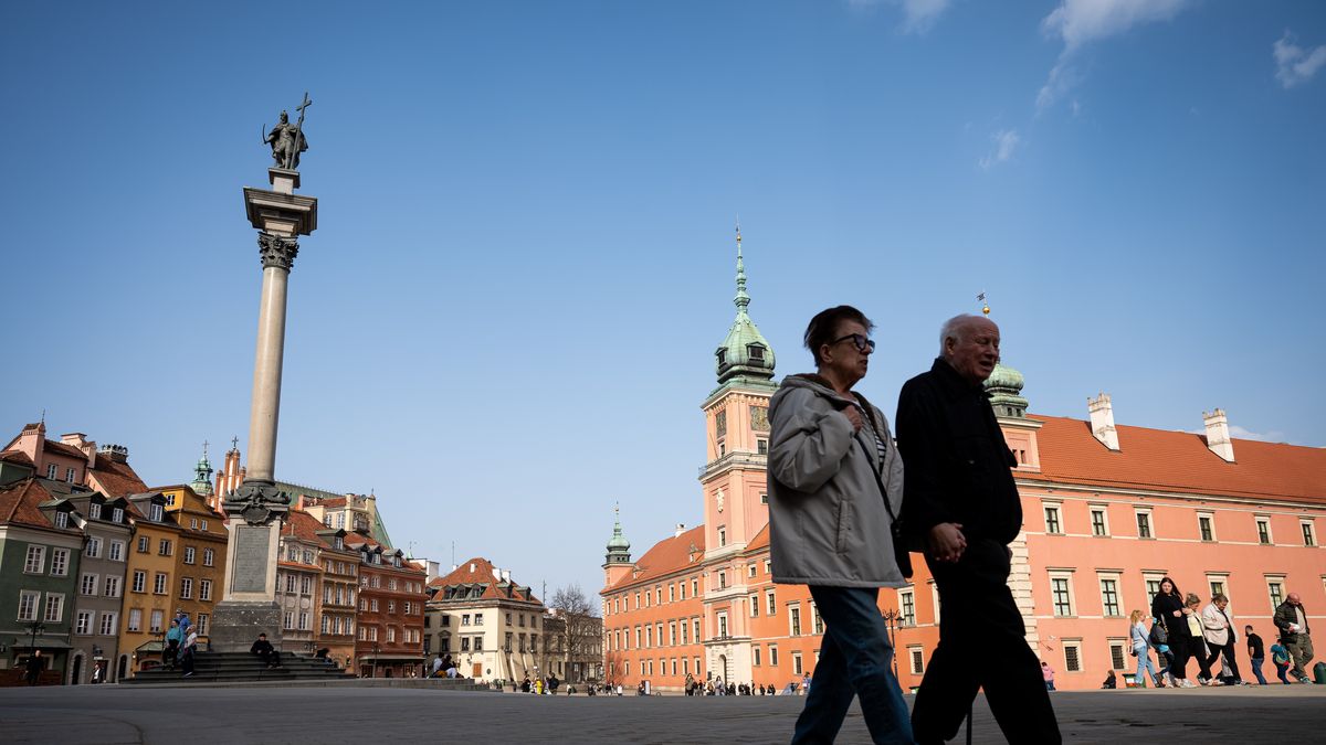 WARSAW, POLAND - JANUARY 1: People walk through the sunlight across Castle Square near the Sigismund III Vasa Column on March 11, 2026 in Warsaw, Poland. (Photo by Mateusz Slodkowski/Getty Images)
