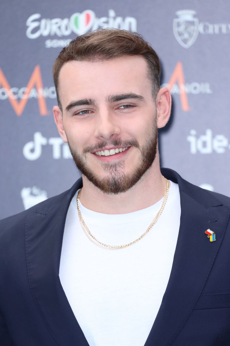 TURIN, ITALY - MAY 08: Krystian Ochman attends the turquoise carpet of the 66th Eurovision Song Contest at Reggia di Venaria Reale on May 08, 2022 in Turin, Italy. (Photo by Daniele Venturelli/WireImage)