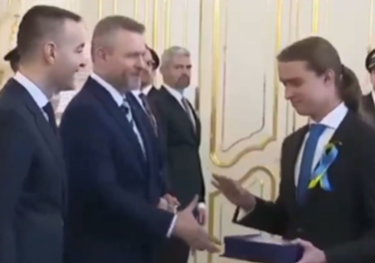 Student's handshake snub of Slovakia's president ignites debate