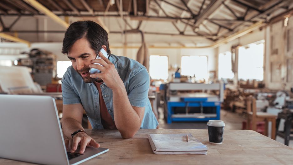 Smiling woodworker discussing designs over a cellphone and working online
Smiling young carpenter working at a bench in his large workshop working online with a laptop and discussing designs with a customer on a cellphone
adult, alone, artisan, bench, business, carpenter, carpentry, caucasian, cellphone, communication, computer, confident, connected, copy space, craft, craftsman, craftsperson, customer, DIY, entrepreneur, expertise, happy, industry, internet, laptop, male, man, manufacturing, notebook, online, owner, person, real, small business, smiling, studio, table, talking, technology, trade, tradesman, white, wifi, wireless, wood, woodworker, woodworking, working, workshop, young