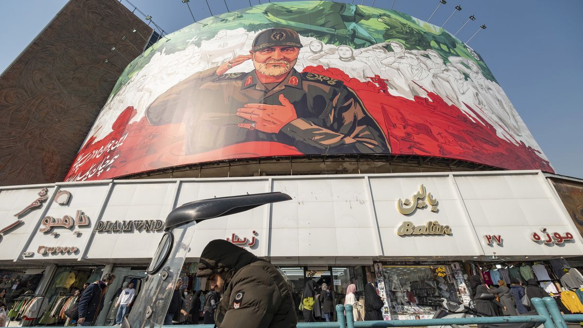 Billboard To Mark Qassem Soleimani
A billboard depicting symbolic images of the former commander of the Islamic Revolutionary Guard Corps (IRGC) Quds Force, Major General Qassem Soleimani, and Iranian athletes is hung on a state building in downtown Tehran, Iran, on January 6, 2026. General Qassem Soleimani is killed in a U.S. airstrike at Baghdad International Airport in 2020. (Photo by Morteza Nikoubazl/NurPhoto via Getty Images)
NurPhoto
israeli-attack, major-general, iranian-parliament, january 6, morteza nikoubazl, anti-zionism, irgc, benjamin-netanyahu, baghdad international airport, u.s., state building, ali-larijani, former commander, donald-trump, downtown tehran, photo, islamic-revolutionary-guard-corps, depiction, attack, iran-supreme-leader, quds-force, u.s. air strike, ayatollah-ali-khamenei, nurphoto, qassem-soleimani, attack-on-u.s., iranian athletes, u.s.-president, parliament-spokesman, defence, politic, attack-on-israel, tel-aviv, israeli-prime-minister, symbolic images, anti-israel