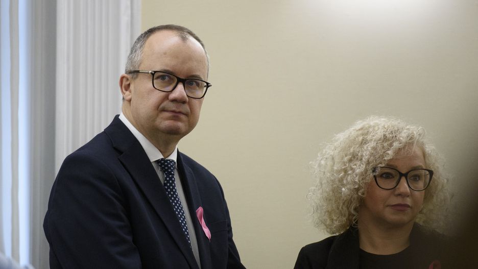 Polish Minister of Justice Adam Bodnar (L) and Equality Minister Katarzyna Kotula (R) look on as they arrive at the weekly ministerial meeting in Warsaw, Poland, on October 15, 2024. (Photo by Aleksander Kalka/NurPhoto via Getty Images)
