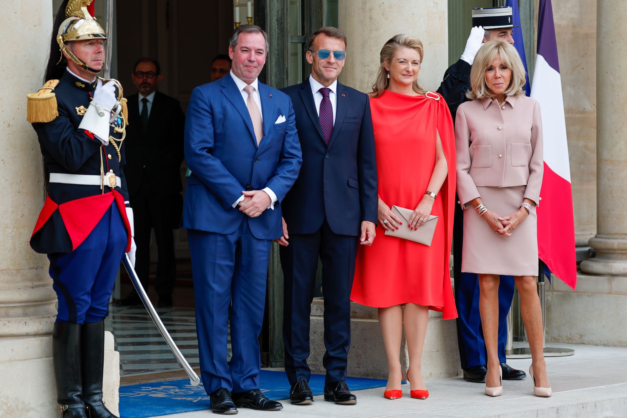 Brigitte i Emmanuel Macronowie witają królewską parę