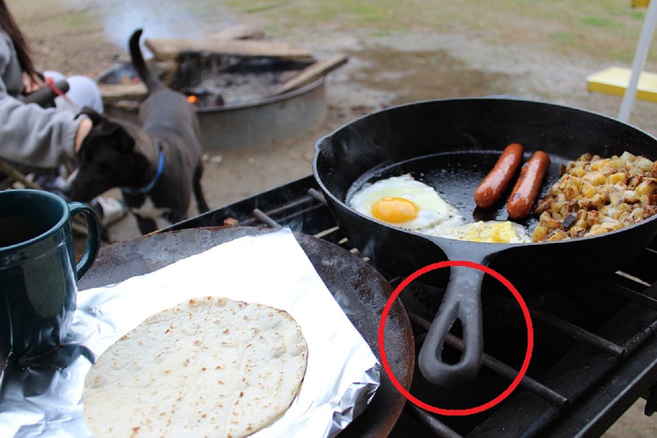 The hole in the handle of the frying pan has a specific purpose.